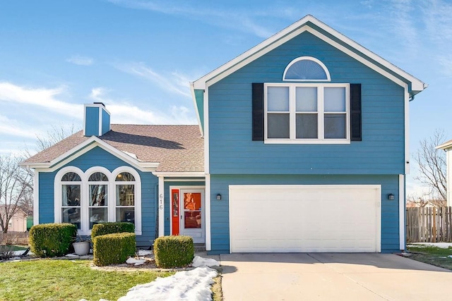 front of property with a garage