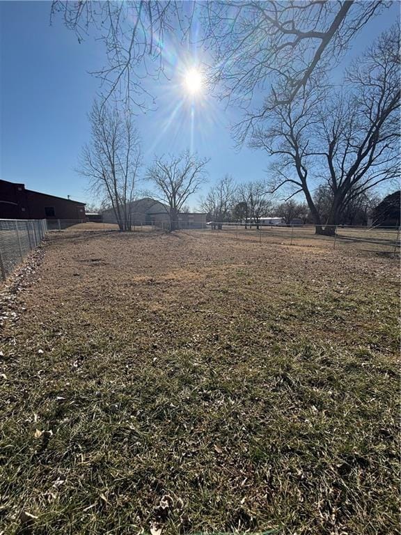 view of yard with a rural view