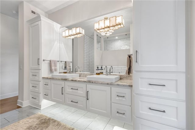 bathroom with vanity and backsplash