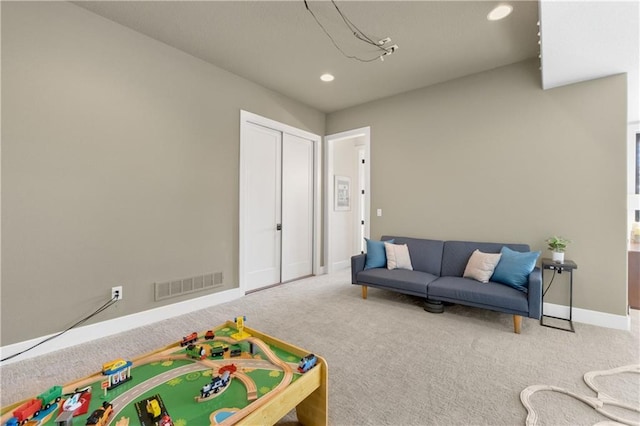 recreation room featuring carpet flooring