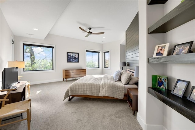 carpeted bedroom featuring ceiling fan