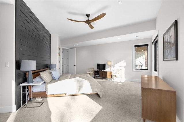 carpeted bedroom with ceiling fan