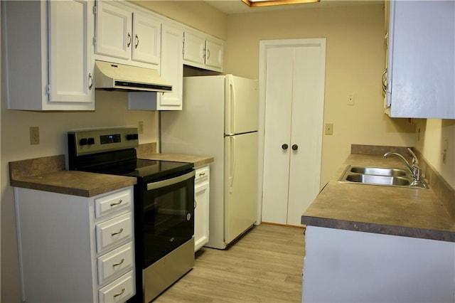 kitchen featuring light wood-type flooring, stainless steel range with electric stovetop, sink, and white cabinets