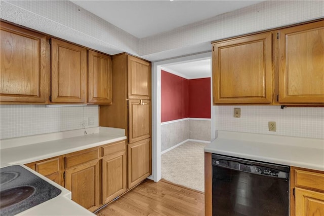 kitchen featuring light hardwood / wood-style floors and dishwasher