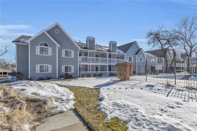 view of snow covered house