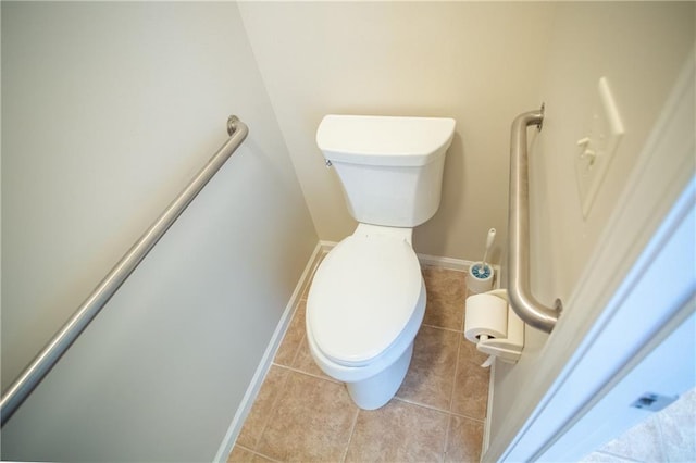 bathroom with tile patterned floors and toilet