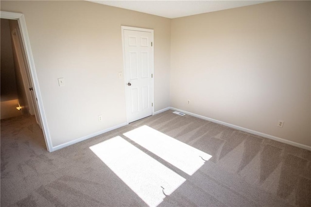 unfurnished bedroom featuring carpet flooring