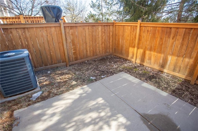 view of patio with central AC