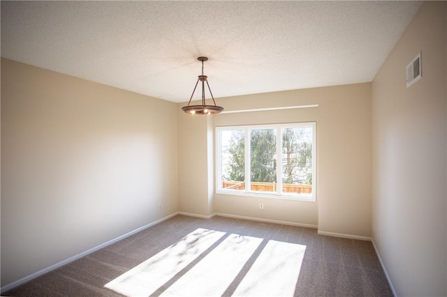 6323 W 145th St, Overland Park, KS 66223 - carpeted spare room featuring baseboards and a textured ceiling