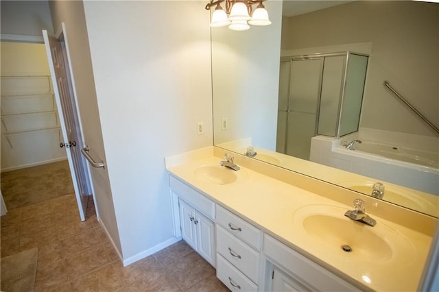 6323 W 145th St, Overland Park, KS 66223 - bathroom with double vanity, a stall shower, baseboards, a bath, and tile patterned floors