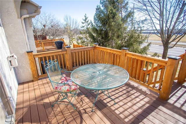 6323 W 145th St, Overland Park, KS 66223 - wooden deck with outdoor dining space