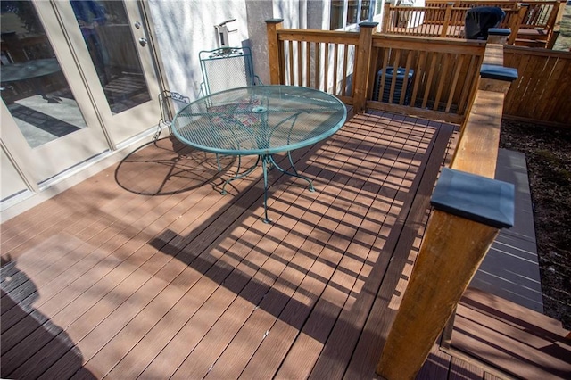 6323 W 145th St, Overland Park, KS 66223 - wooden deck with outdoor dining space
