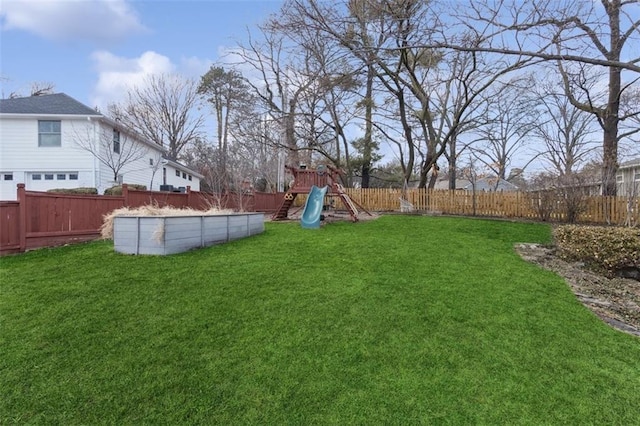 view of yard with a playground