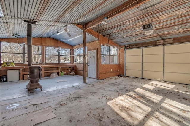 garage with fridge and a garage door opener