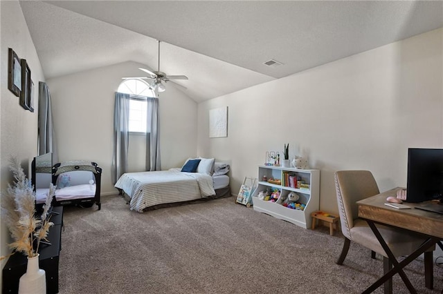 carpeted bedroom with lofted ceiling and ceiling fan