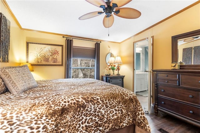 bedroom featuring ensuite bathroom, ornamental molding, and ceiling fan