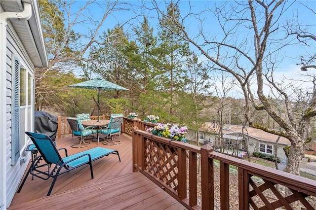 wooden deck featuring grilling area