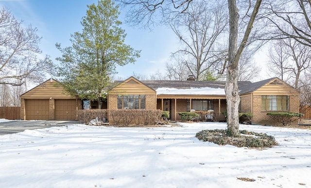 single story home with a garage