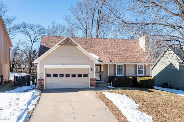 single story home featuring a garage