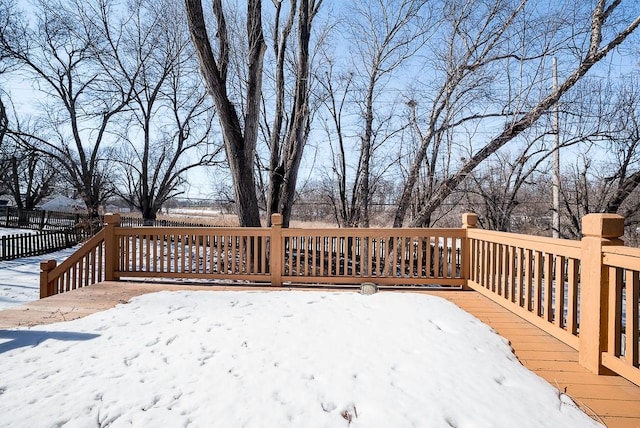 view of snow covered deck