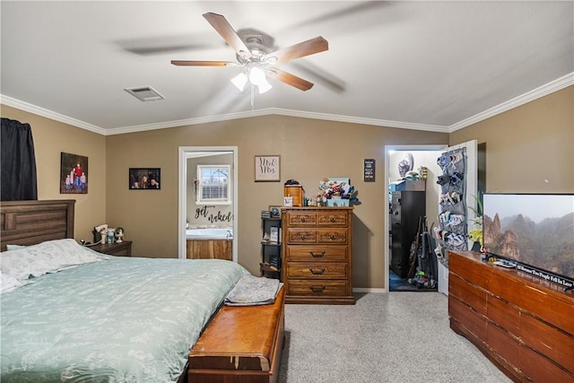 bedroom featuring crown molding, lofted ceiling, connected bathroom, and ceiling fan