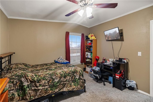 bedroom with ornamental molding, carpet, and ceiling fan