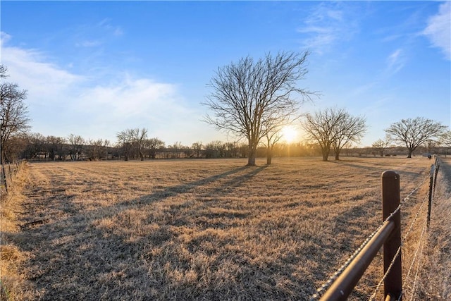 view of yard with a rural view