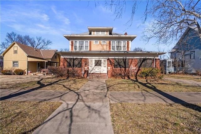 view of front facade with a front yard