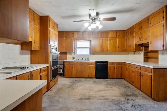 kitchen featuring sink, dishwasher, ceiling fan, tasteful backsplash, and cooktop