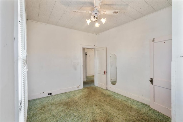 interior space with ceiling fan and carpet flooring