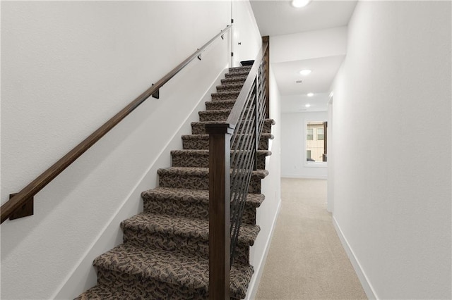 stairs with carpet floors