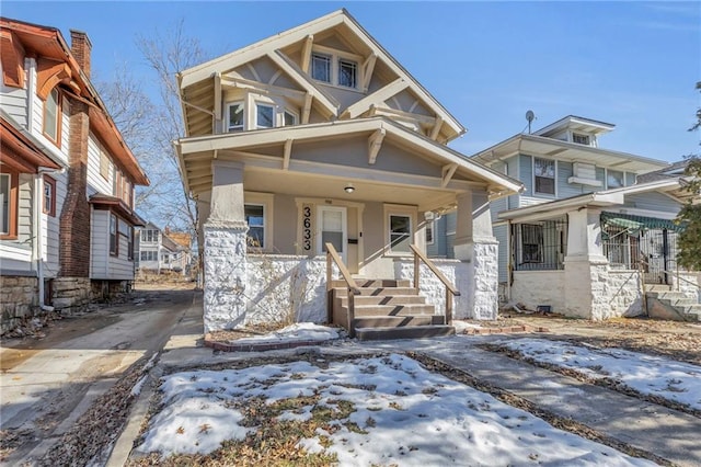 view of front of property featuring covered porch