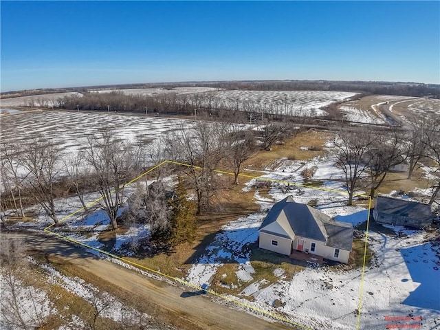 snowy aerial view with a rural view