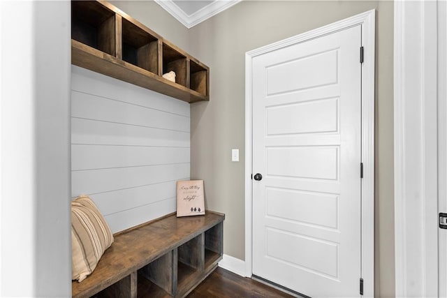 mudroom featuring dark hardwood / wood-style flooring and crown molding