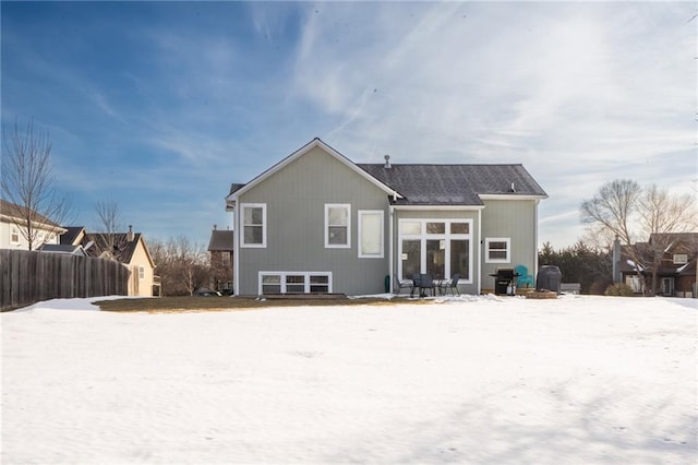 view of snow covered house