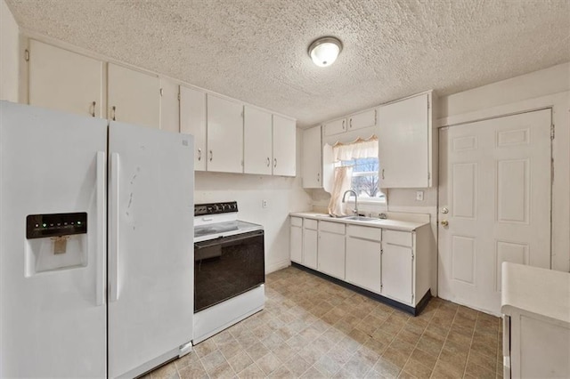 kitchen featuring sink, white appliances, a textured ceiling, and white cabinets