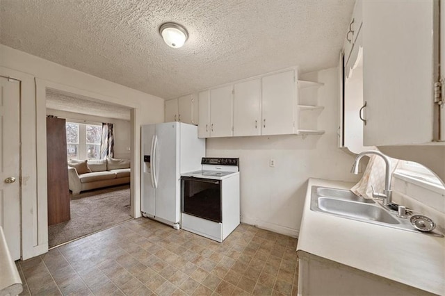 kitchen featuring white cabinetry, sink, white appliances, and a textured ceiling