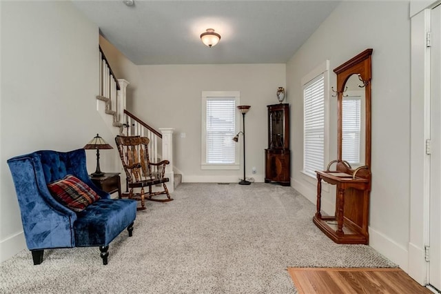 living area with carpet flooring