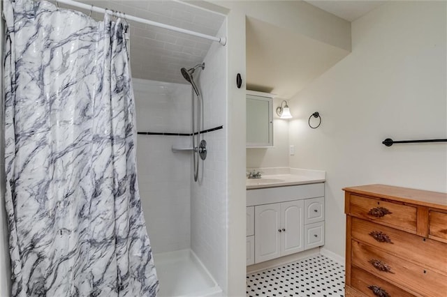 bathroom featuring vanity and a shower with curtain