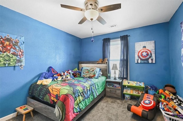 carpeted bedroom featuring ceiling fan