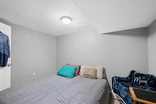 bedroom featuring a textured ceiling