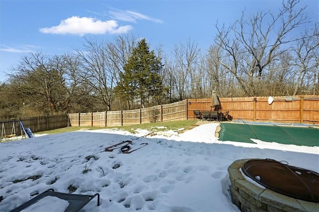 view of yard covered in snow