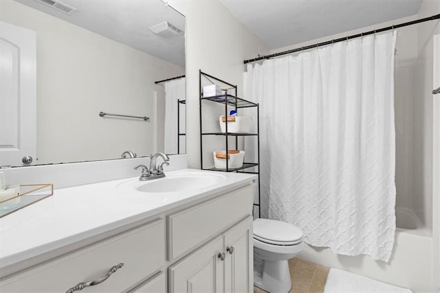 full bathroom with shower / bath combo, vanity, tile patterned floors, and toilet