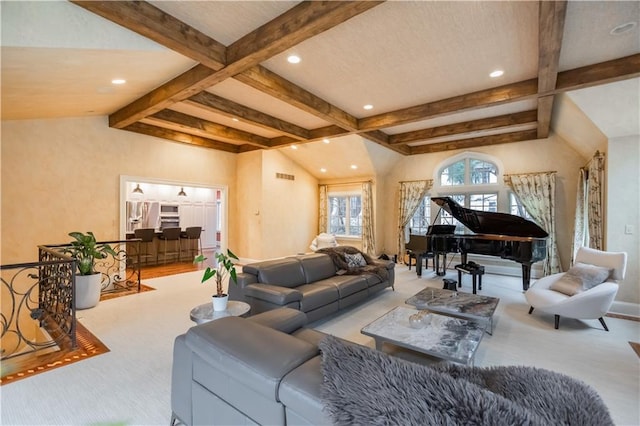 living room featuring vaulted ceiling with beams and carpet