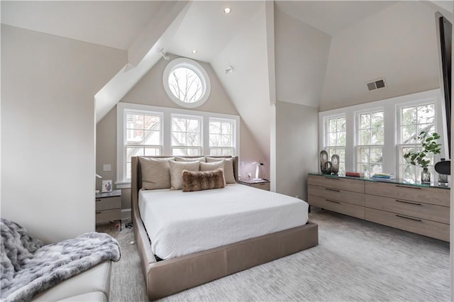 bedroom featuring carpet and vaulted ceiling with beams