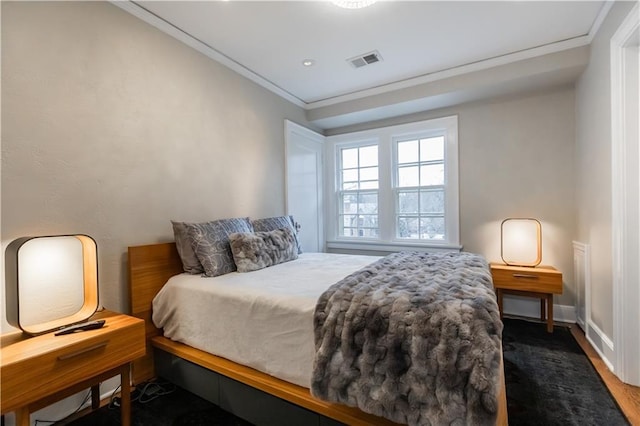 bedroom featuring ornamental molding