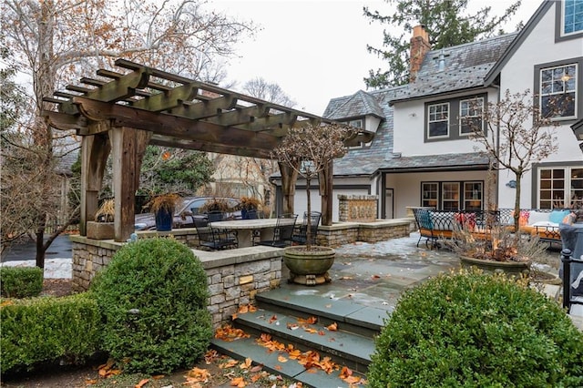 exterior space with an outdoor living space and a pergola