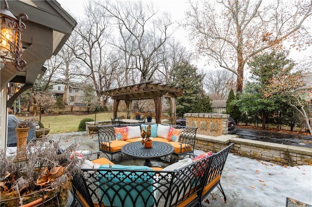 view of patio with an outdoor living space and a pergola