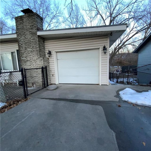 view of snow covered garage