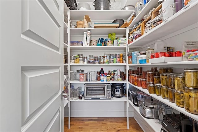 storage area featuring a toaster